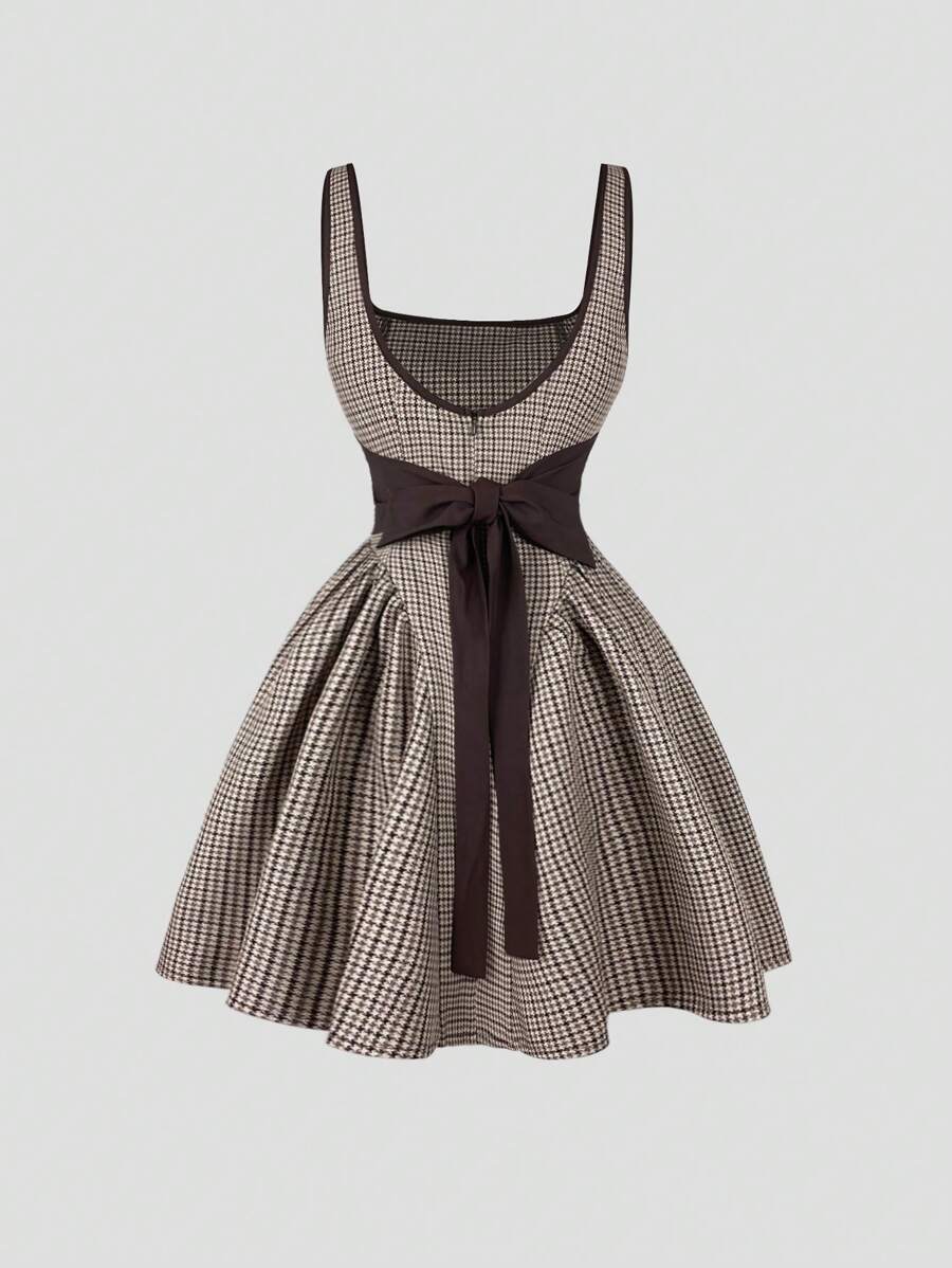 Step out in style with this Retro French Plaid Bow Tie-Up Camisole Dress. Featuring a flattering cinched waist and a flirty back cutout, it’s perfect for turning heads. The charming plaid pattern adds a vintage vibe, while the bow tie-up detail brings a playful touch. Ideal for sunny days or casual nights out, this dress combines comfort and sass effortlessly.