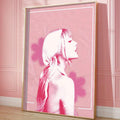 Pink pop-art portrait wall poster in a warm wood frame