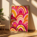 Retro geometric rainbow arch wall art in fuchsia, pink, orange, and burgundy
