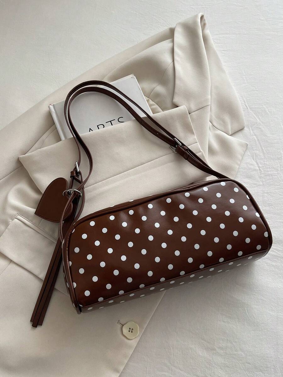 Image 1 - front view of Retro Polka Dot Handbag – Chic Versatile Shoulder Bag with Tassel for Summer 2026