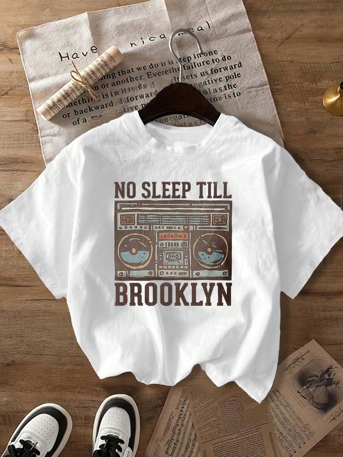 Rock your style with this Retro Punk Rock "Don't Sleep Until Brooklyn" T-Shirt, featuring a bold boombox design perfect for women who love casual, edgy fashion. Its playful vibe makes it a standout piece for day or night, adding a fun, rebellious touch to any outfit. Comfortable and cool, it’s your go-to tee for making a statement wherever you go.