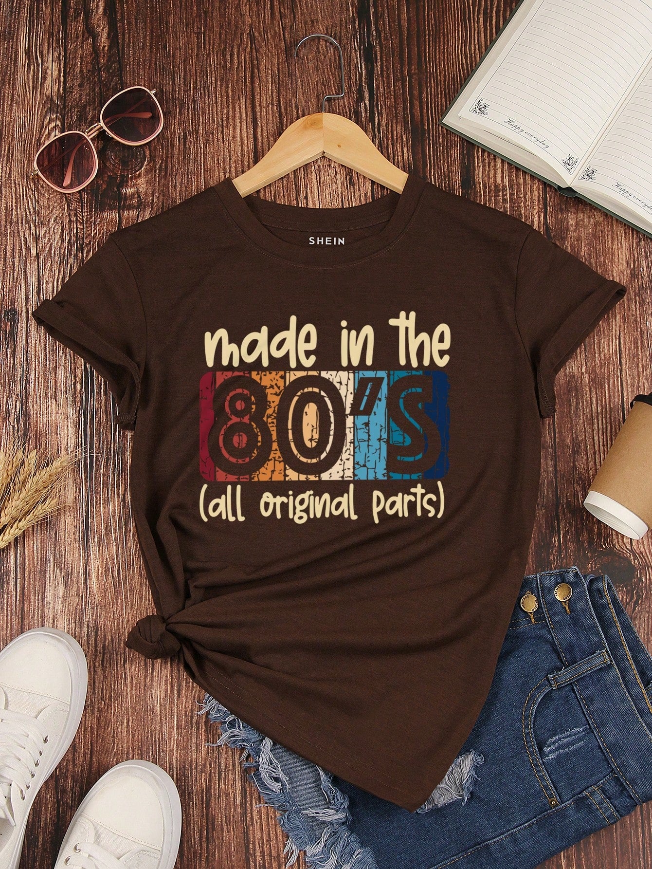 Add some retro vibes to your wardrobe with this fun and playful graphic tee for women! Made with all original parts from the 80's, it's the perfect shirt for any nostalgic fashionista. Show off your unique style and love for the 80's with this quirky and trendy t-shirt.