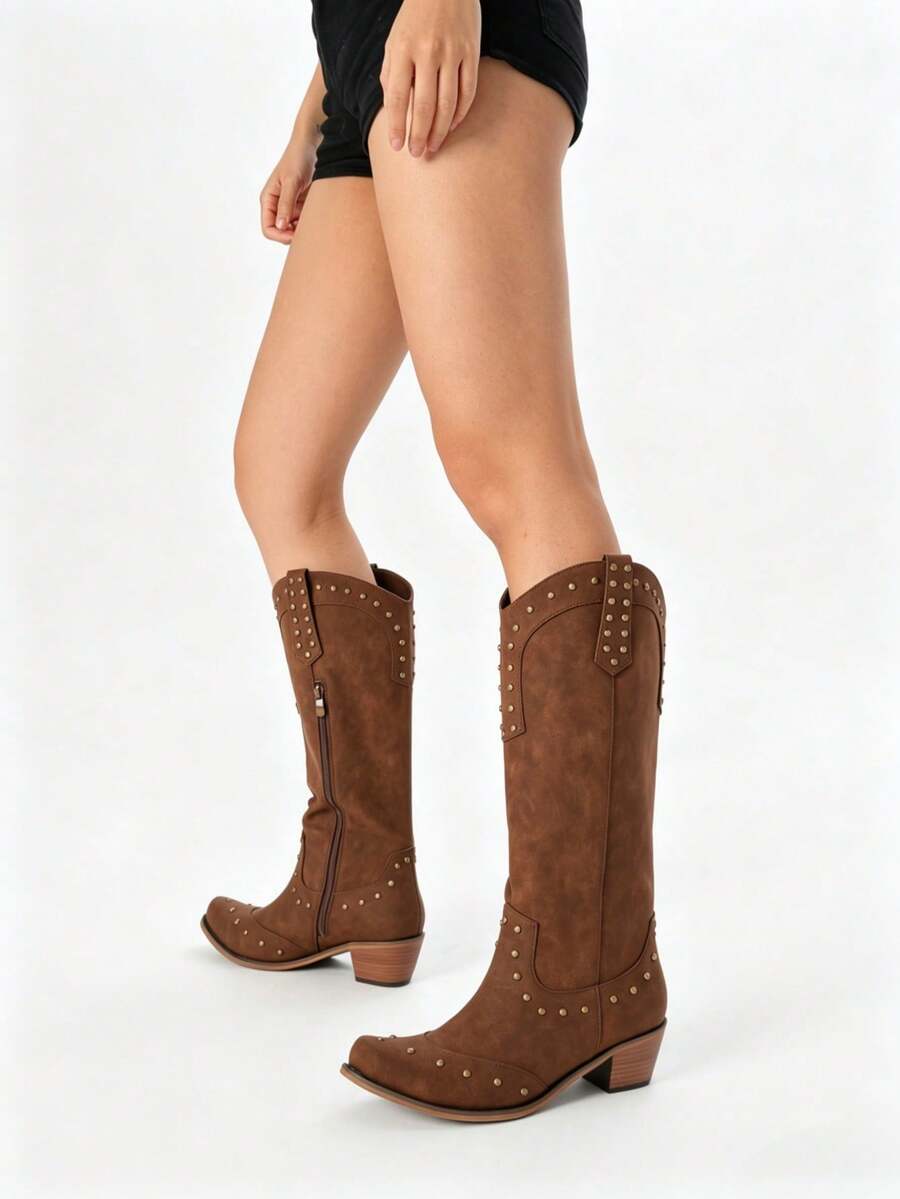 Front view of Retro Western Cowboy Boots for Women – Studded Knee-High Fashion with Chunky Heels and Side Zipper for Country Concerts for punk motorcycle boot styling