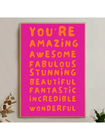 Retro typography wall art with uplifting words in orange on a pink background
