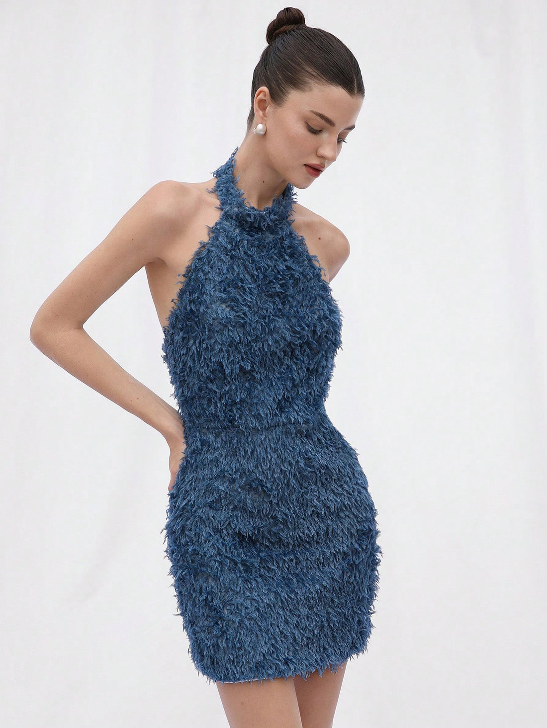 Turn heads at every summer party with this Romantic Bodycon Mini Dress. Crafted from soft, furry fabric, it hugs your curves while keeping you cool and comfortable. Its sleeveless design adds a flirty touch, making it perfect for warm, fun-filled evenings. Embrace elegance with a playful twist in this cute and cozy dress that’s sure to be your go-to for unforgettable nights.