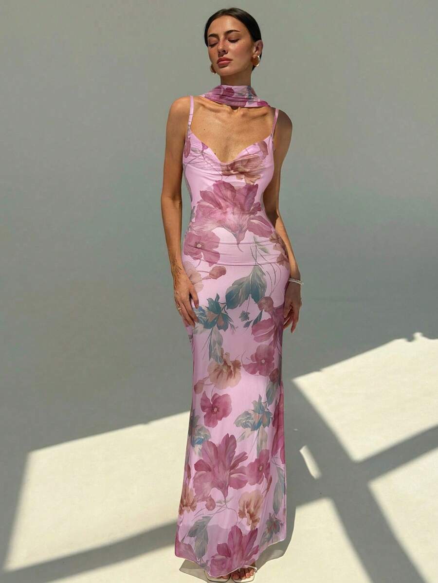 Twirl into romance with this dreamy floral mesh backless dress that screams effortless boho vibes. The extra-long straps drape beautifully, creating a flattering silhouette while the sheer mesh overlay adds an ethereal touch. Perfect for garden parties, beach weddings, or any occasion where you want to feel like the main character. The backless design keeps things breezy and bold—because sometimes less is definitely more. Slip it on and let your free spirit shine.