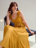 Step into effortless charm with this Romantic French-Style Long Dress, featuring playful ruffles and a flirty asymmetrical hem. Perfect for holiday strolls or dreamy evenings, its flowing silhouette adds a touch of whimsy to your look while keeping you comfortable and chic. Embrace the spirit of romance and make every moment feel like a getaway.