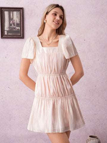 Step into romance with this French cherry blossom-inspired pink dress. Its glossy, silky shine and textured fabric bring a playful flair, while the square neckline adds a charming, elegant touch. Perfect for twirling through sunny days or sparkling evenings, this dress makes every moment feel like a sweet springtime daydream.