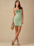 Unleash your inner romantic with our sweet and playful Green 3D Flower Mini Dress! This charming dress features delicate ruching and ruffles, perfect for a summer fashion statement. The spaghetti straps add a touch of flirtiness, while the 3D flower adds a unique and quirky touch. Beauty and fun all in one!