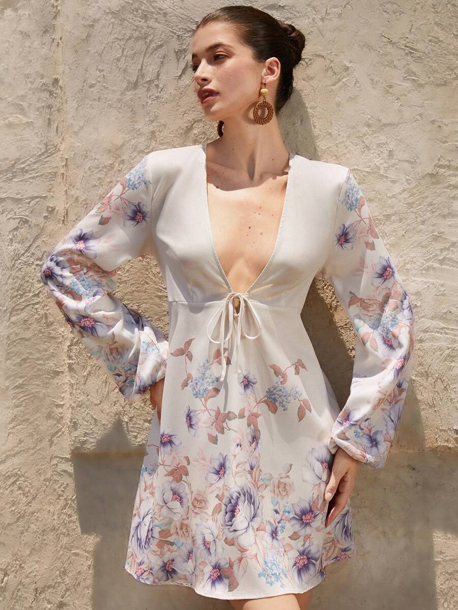 Slip into effortless elegance with this romantic short dress, designed to turn heads at every getaway. The daring deep V neckline and delicate bowknot waist detail create an irresistibly chic silhouette that balances sophistication with playful charm. Perfect for sunset dinners, beachside cocktails, or those Instagram-worthy vacation moments, this high-end piece brings that coveted resort-wear vibe to your wardrobe. Whether you're exploring a new destination or simply feeling fabulous, this dress is your ti