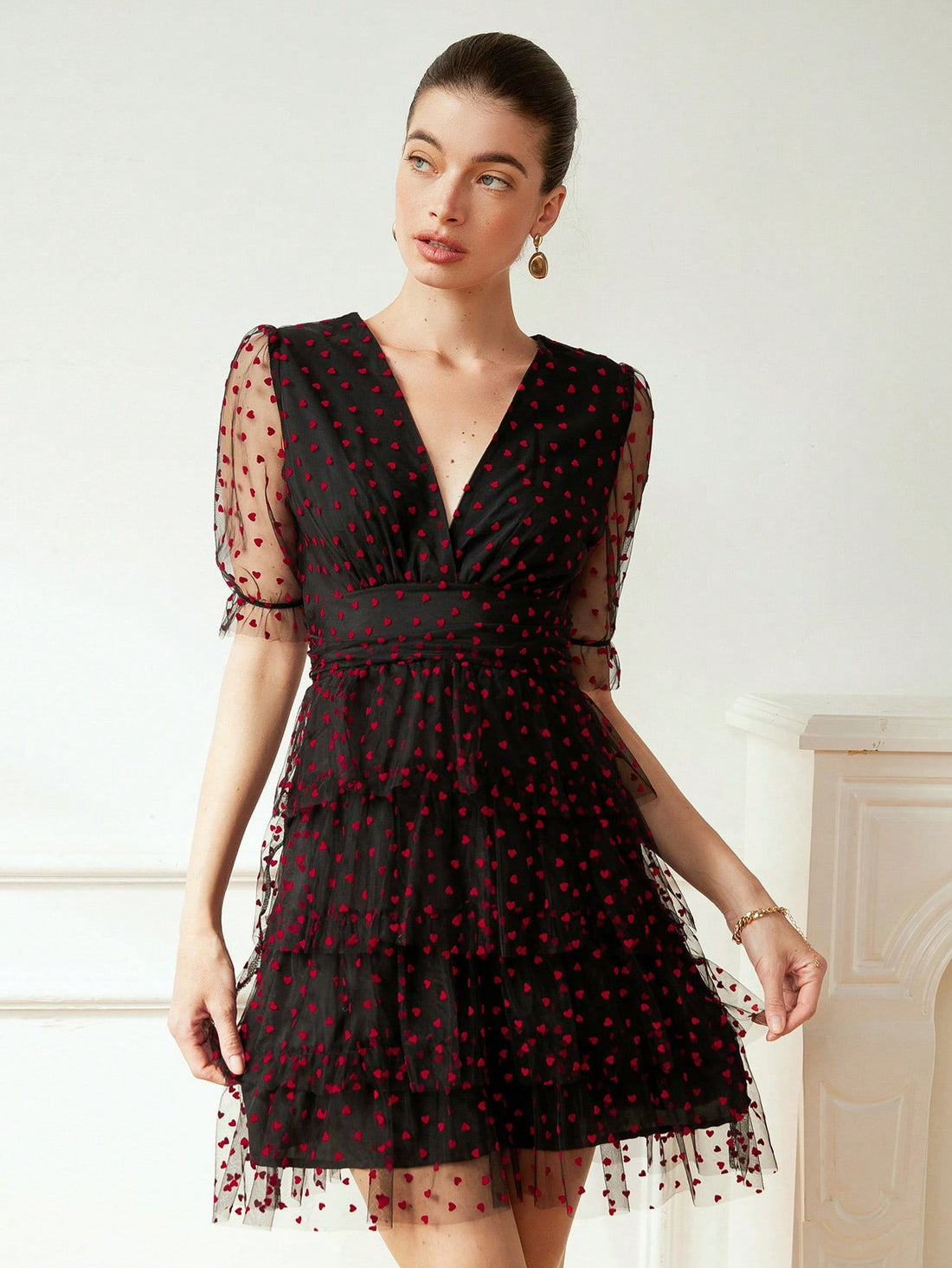 Spread the love with our Romantic Midi Dress. Designed with flocked heart polka dots, this dress is perfect for Valentine's Day (or any date night). It's the perfect mix of playful and romantic, making it a must-have for any fashionista's wardrobe.