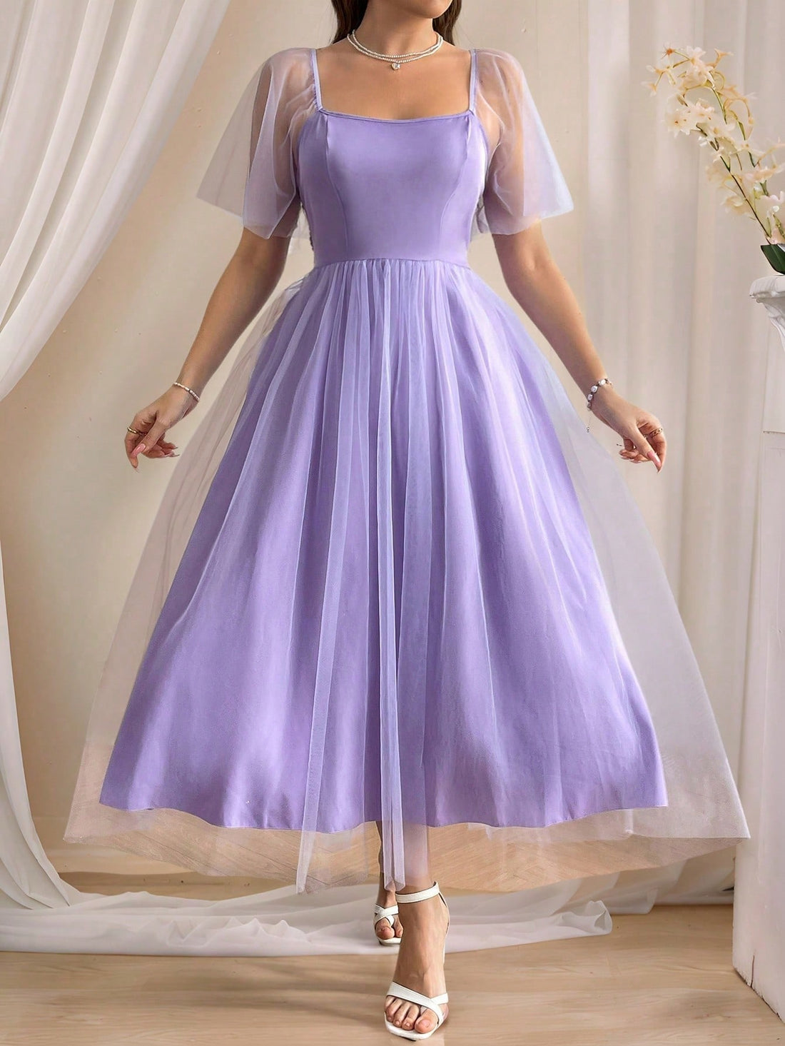 Step into charm with this Romantic Ruffle Sleeve Maxi Dress. Its flowing silhouette and playful ruffle sleeves add a flirty touch to any occasion. Crafted in a solid color, it’s effortlessly elegant and ready to twirl you through days and nights with style and grace. Perfect for making memories that sparkle!