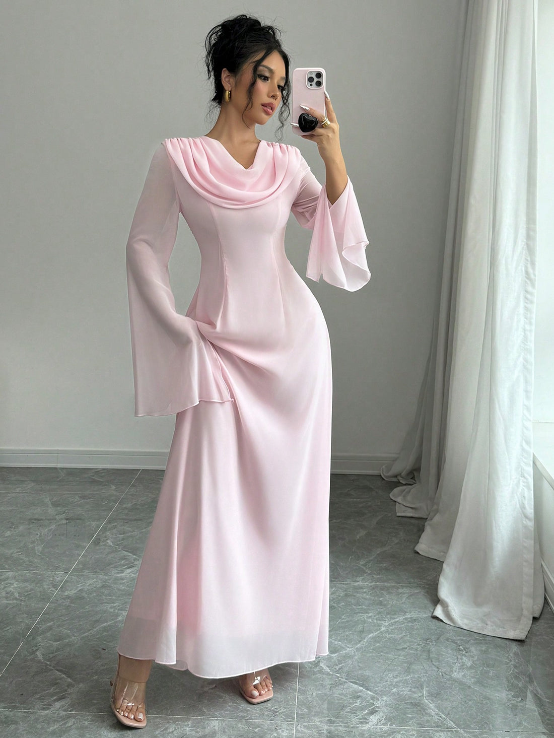 This elegant vintage-inspired dress features a romantic ruffled collar and flared sleeves, adding a touch of timeless charm to your wardrobe. Its classic design and high-quality material make it the perfect choice for any special occasion. Elevate your style with this sophisticated and feminine dress.