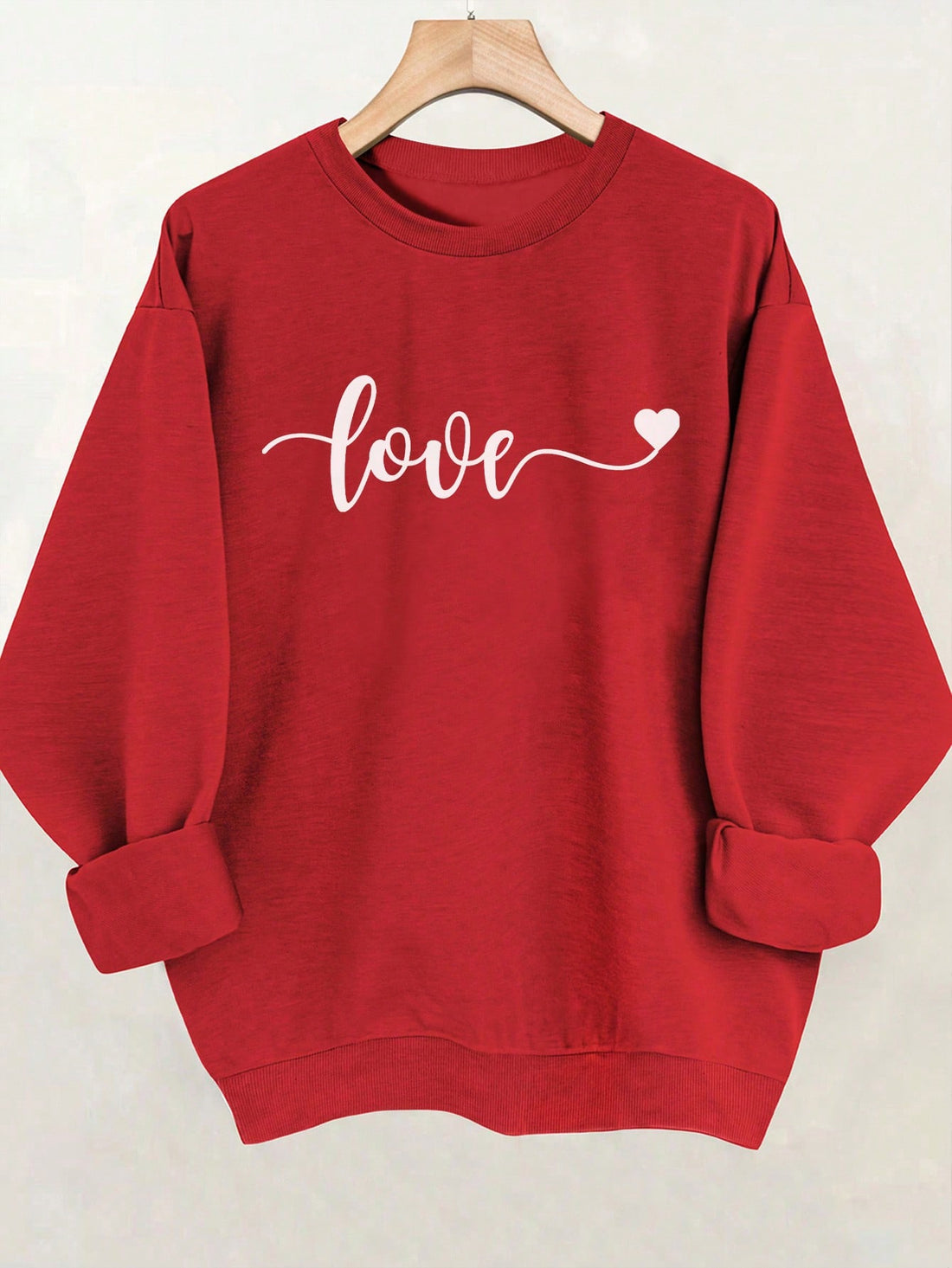 Get ready to cozy up with your lovebird in our Romantic Vibes Valentine Sweatshirt. Featuring a cozy style perfect for snuggles and a playful design that will set the mood, this sweatshirt is a must-have for any romantic occasion. Pair it with your favorite jeans and get ready to spread the love!