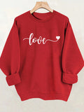 Get ready to cozy up with your lovebird in our Romantic Vibes Valentine Sweatshirt. Featuring a cozy style perfect for snuggles and a playful design that will set the mood, this sweatshirt is a must-have for any romantic occasion. Pair it with your favorite jeans and get ready to spread the love!