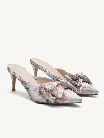 Step out in style with our Roses & High Heels Pointed Toe Slip-On Pump Shoes. These chic pumps feature a sleek pointed toe design, perfect for any occasion. Slip them on and elevate your look with effortless sophistication. Made with high quality materials for durability and comfort.