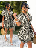 Collage front views of cream and black tropical butterfly print belted mini shirt dress