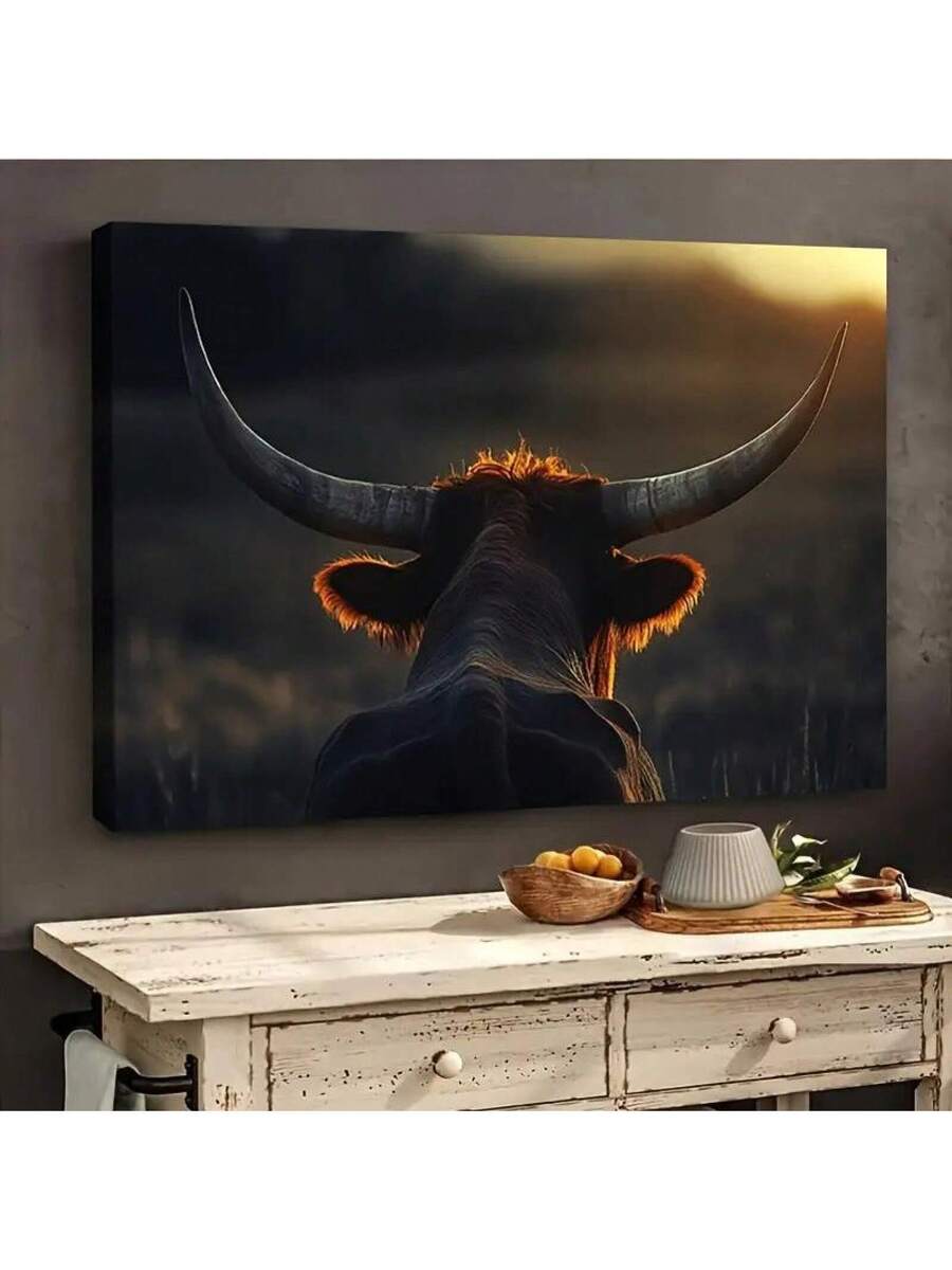 Sunset cow canvas print with longhorn silhouette and warm rim light