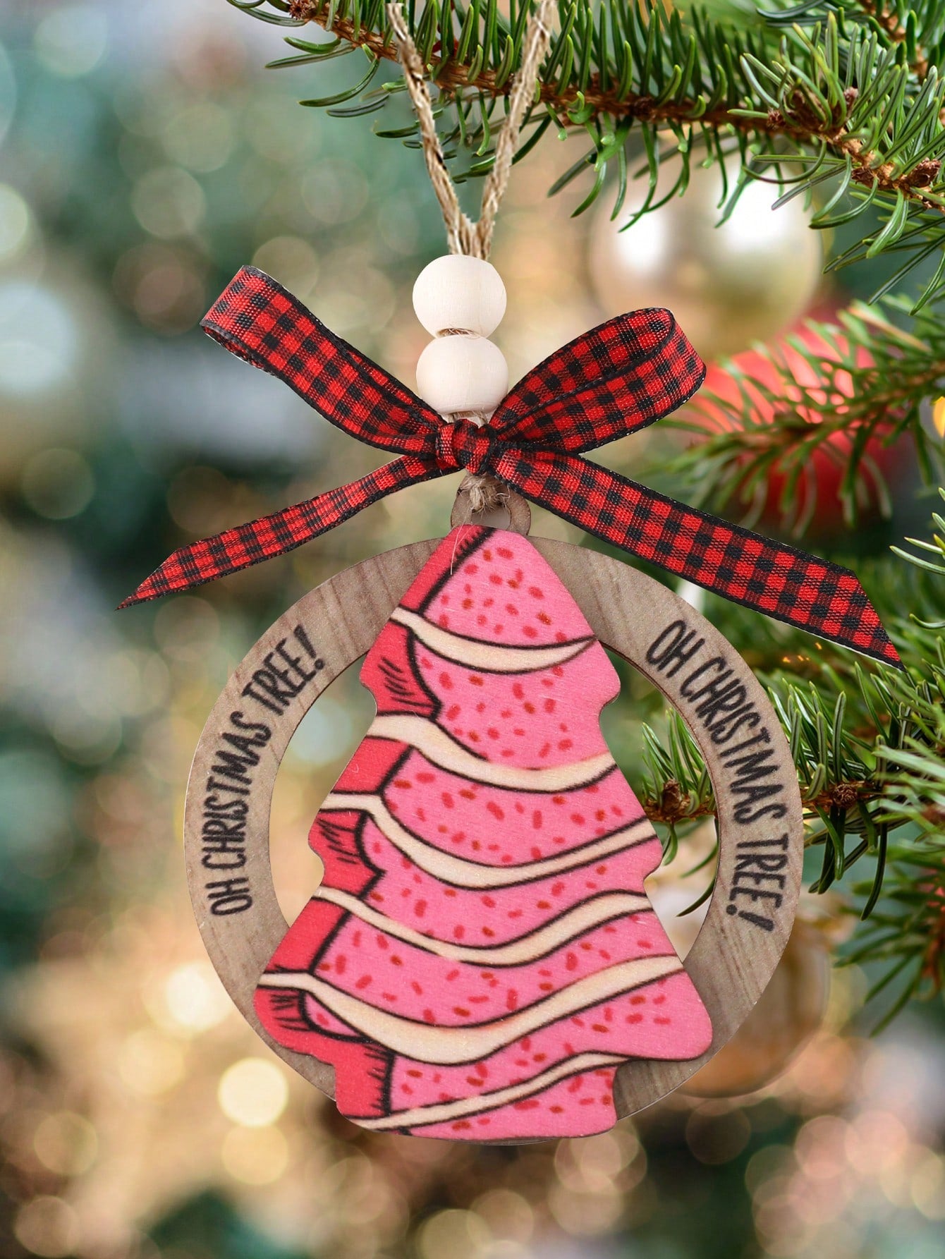 Add a rustic touch to your holiday decor with this wooden 'Oh Christmas Tree' ornament. The hollow design adds dimension while maintaining a classic charm. Perfect for any tree or as a unique addition to your holiday displays. Made with high-quality wood for a lasting, festive addition to your home.
