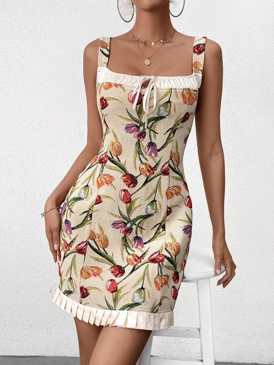 Experience luxury with our Satin Splendor dress. Made from high-quality jacquard fabric, this dress features a flattering tie-front design and a feminine ruffled hem. A perfect choice for formal events, this bodycon dress will elevate your style and make you stand out from the crowd.