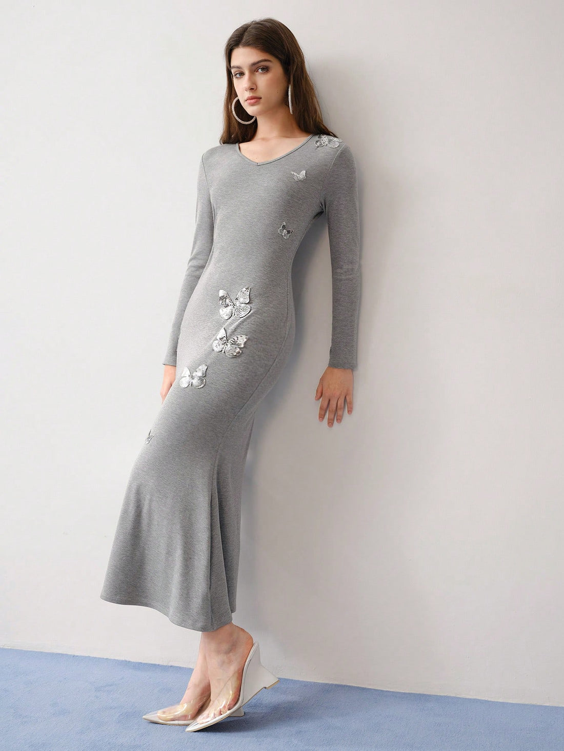 Turn heads effortlessly in the Sequin Butterfly Bias Cut Dress, where shimmering sequins meet a flattering bias cut for a silhouette that dances with every move. Perfect for evenings when you want to sparkle with a playful, chic vibe, this dress brings a touch of whimsy and elegance to your night out. Embrace your inner butterfly and let your style take flight!