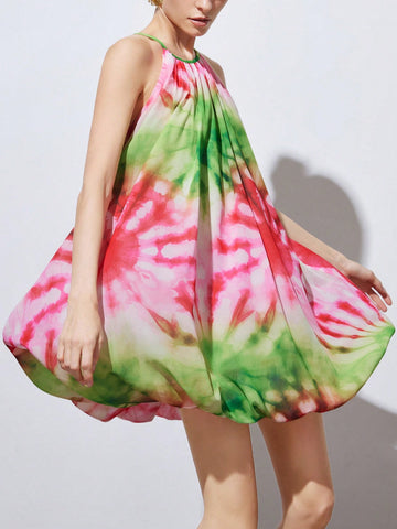 Embrace the playful vibes of the Serene Sunset Mini, featuring a vibrant pink and green tie-dye pattern that turns heads effortlessly. Its halter neck and backless design keep things flirty and fresh, perfect for lounging at your favorite resort or casual getaway. Lightweight and breezy, this mini dress blends comfort with a splash of bold style for your sun-soaked adventures.