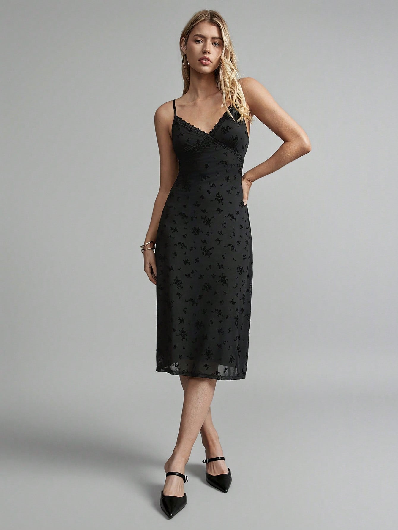 Turn heads at your next summer tea party with this sexy black floral mesh lace bodycon slip dress. Its delicate lace and sheer mesh details create a flirty, feminine look, while the bodycon fit highlights your curves effortlessly. Perfect for warm days and stylish evenings, this dress combines elegance with a playful edge to keep you feeling confident and chic all season long.