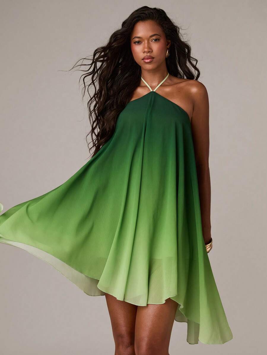 Turn heads in this stunning halter A-line dress, designed for those who love bold Y2K vibes. The backless design and asymmetrical high-low hem create an effortlessly sexy silhouette perfect for vacation getaways and casual outings. Featuring a playful ombre print in eye-catching green, this sleeveless cami-style dress offers a flattering mid-waist fit with an oversized cut for comfort. Lined throughout and crafted from 100% polyester woven fabric, it's easy to care for with simple machine washing. Whether y
