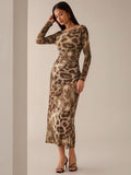 Turn heads with this Sexy Open Back Leopard Print Dress, designed to hug your curves with a slim fit and flattering ruching. The long sleeves add a touch of urban chic, while the daring open back brings out your playful side. Perfect for nights out or making a bold statement wherever you go.