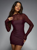 Turn heads in this Sexy Sheer Mesh Mini Dress with a playful cowl back and ruching that flatters your figure. Perfect for a night out on the town, this dress exudes confidence and playfulness. Made with high-quality materials, it's sure to be a staple in your wardrobe. Simply stunning!