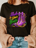 Get ready to party with our Shake Your Bootie t-shirt! Made from soft cotton, this festive Mardi Gras apparel will keep you comfortable while you shake your stuff on Fat Tuesday. It's the perfect way to show off your fun and quirky side during the celebrations. Get yours now and let's get this party started!