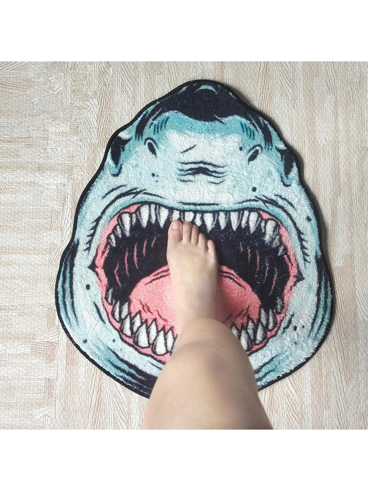 This Shark Attack Bathroom Mat is a practical and playful addition to your home. Featuring a non-slip design and machine washable material, it provides safety and convenience. Its unique shark attack design adds a fun touch to your bathroom decor. Experience the perfect combination of function and style with this mat.