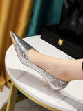 Add a touch of metallic snakeskin to youElevate your style with our Shimmer and Shine: Metallic Snakeskin Party Pumps! These pumps feature a unique combination of metallic snakeskin material and mid heels, adding a touch of glamour to any outfit. Walk with confidence and make a statemer party look with these shimmering pumps. The mid-height heels provide just the right amount of lift, while the unique texture adds a glamorous edge to any outfit. Step out in style with these luxurious and eye-catching shoes.