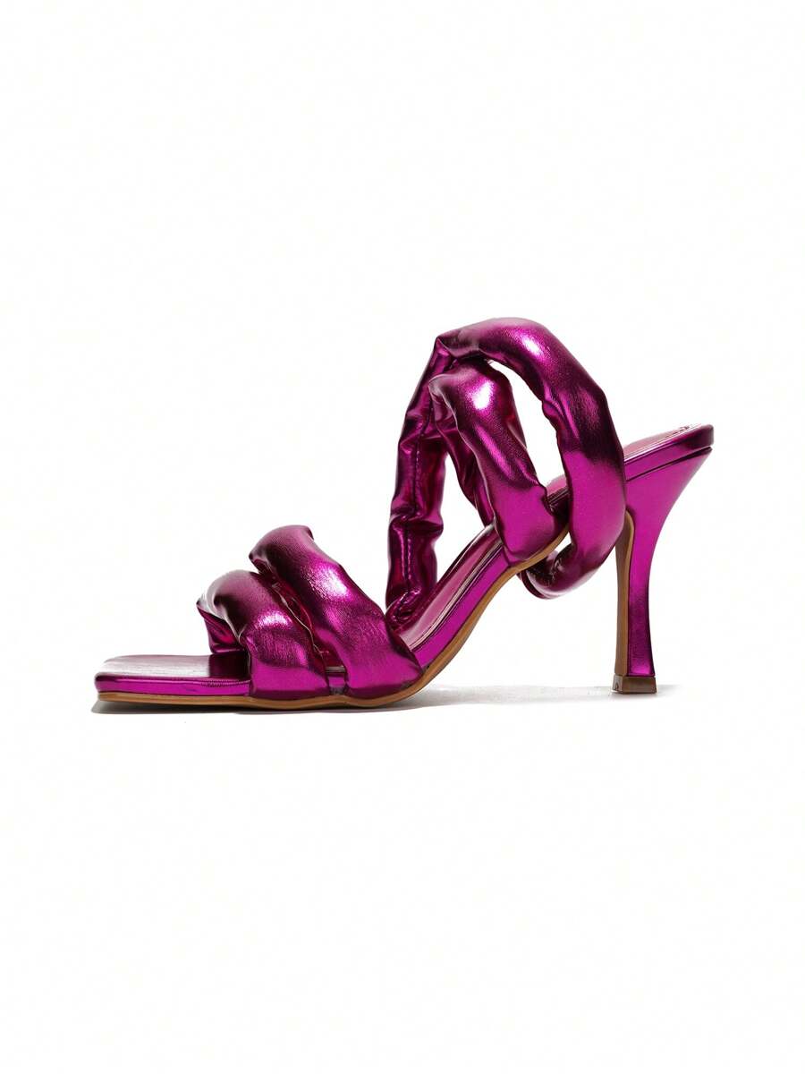 Step into the spotlight with these shimmering metallic faux leather slip-on heeled sandals. Perfect for festival fun, their easy slip-on design keeps you dancing all day while the sparkling finish adds a playful pop to any outfit. Elevate your style effortlessly and let your feet do the talking!