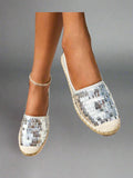 Introducing Shimmering Steps: Metallic Detail Espadrille Flats for Summer Vacation. These stylish flats feature a metallic design that adds a touch of glamour to any outfit. Perfect for your summer vacation, these flats will keep you comfortable and stylish. Step into your vacation in style with Shimmering Steps.
