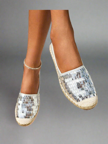 Introducing Shimmering Steps: Metallic Detail Espadrille Flats for Summer Vacation. These stylish flats feature a metallic design that adds a touch of glamour to any outfit. Perfect for your summer vacation, these flats will keep you comfortable and stylish. Step into your vacation in style with Shimmering Steps.