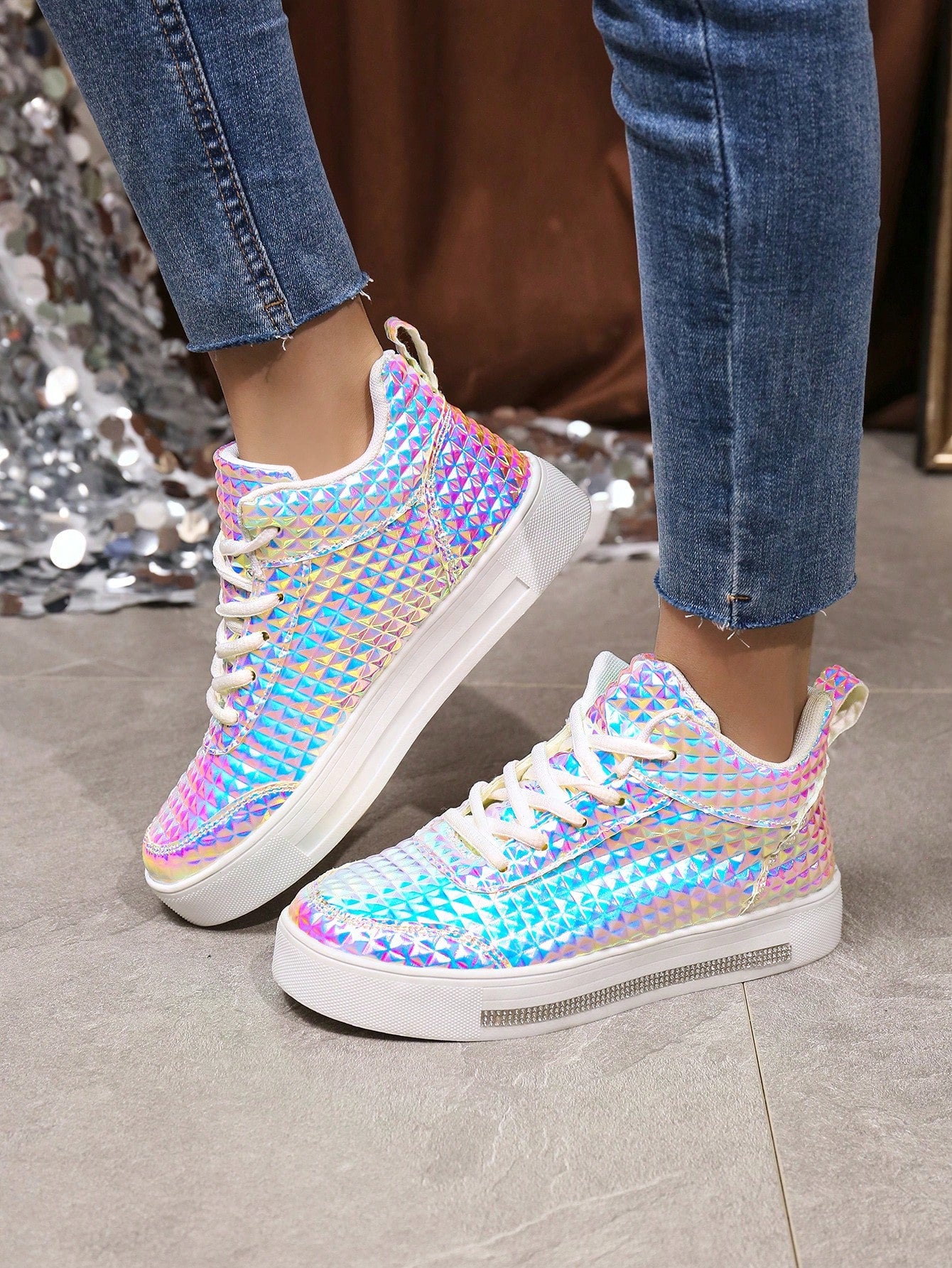 Elevate your outdoor style with our Shiny High-Top Comfort Fashion Sneakers. With a glossy finish and high-top design, these sneakers offer both fashion and comfort. Perfect for versatile outdoor wear, so you can explore in style without sacrificing comfort.