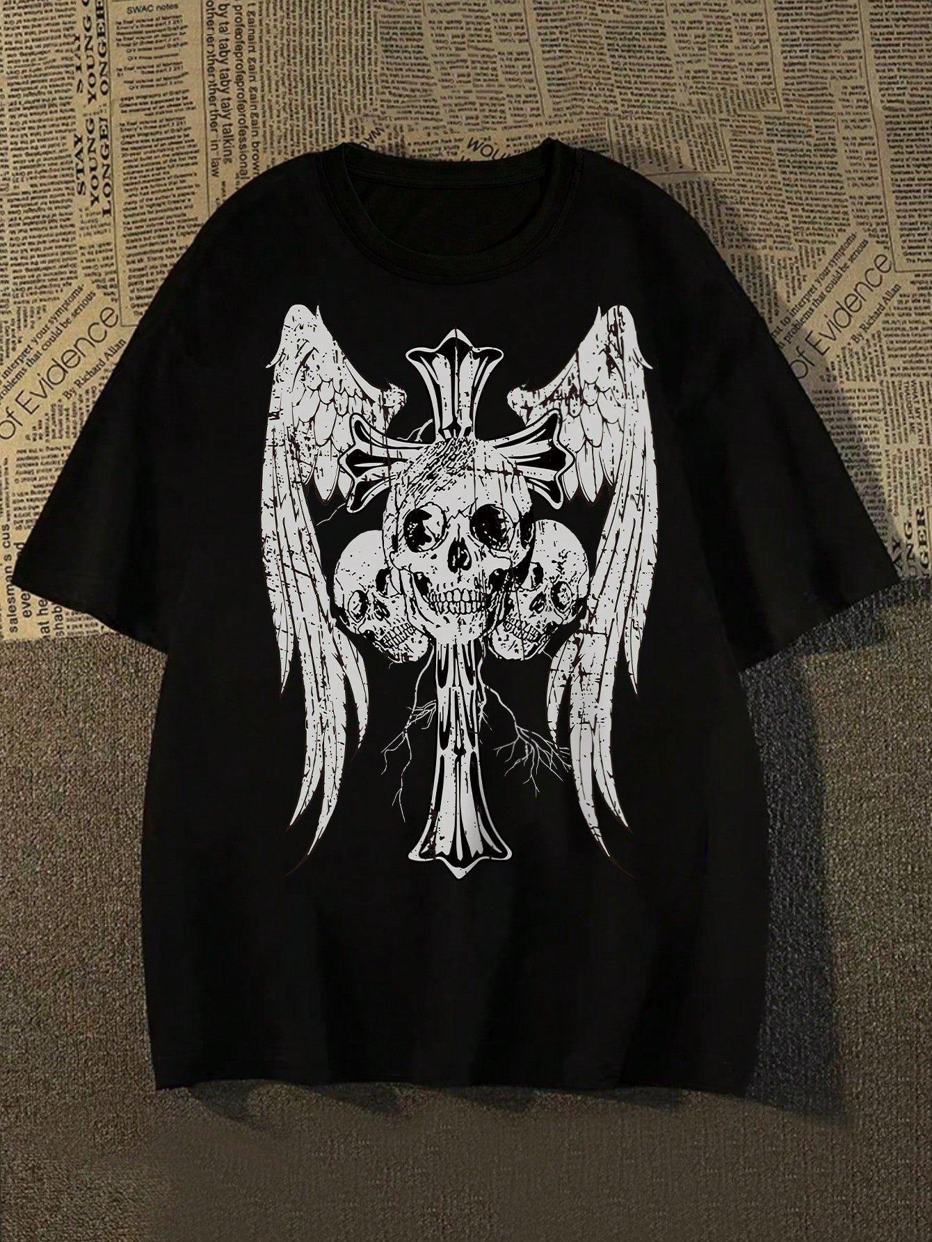 Unleash your edgy side with our Skull Wings Men's Graphic Tee. Made for those who dare to be different, this tee features a bold graphic of skull wings for a unique and daring look. Made with high-quality materials, this tee is comfortable and stylish. Embrace your edgy style today.