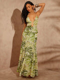 Step into summer style with this sleek olive green zebra print maxi dress. Featuring a daring plunge neckline and a flowing silhouette, it’s perfect for beach strolls or sunset dinners. The bold print adds a playful edge, while the lightweight fabric keeps you cool and comfortable. Make every vacation moment effortlessly chic.