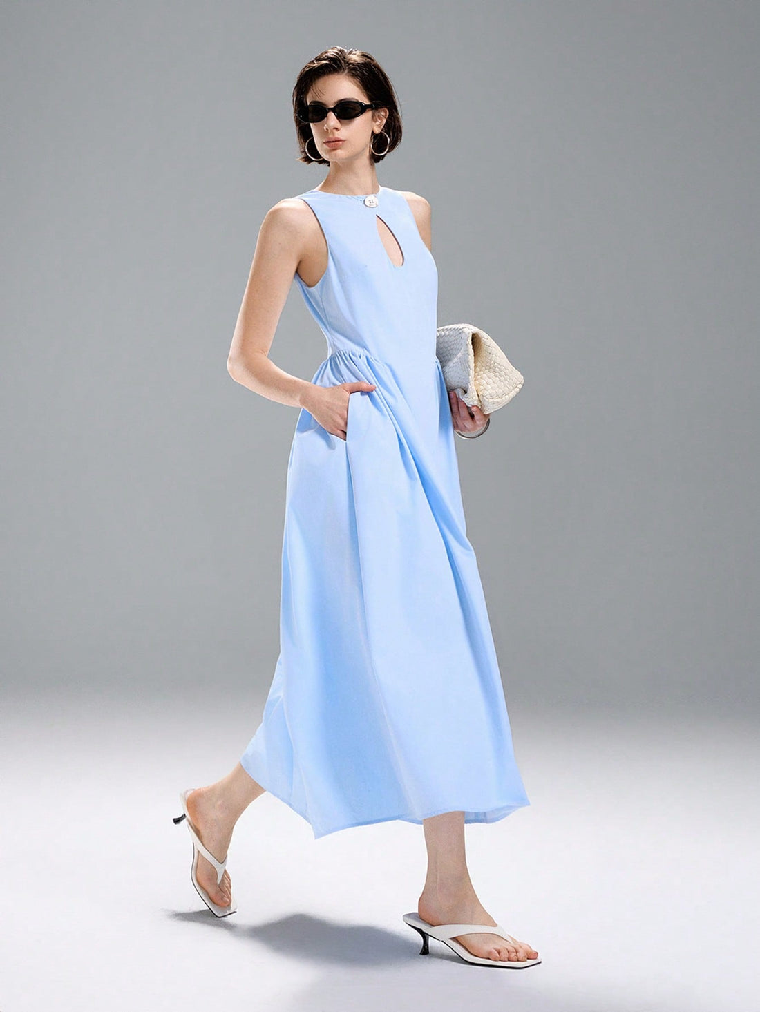 Step into summer with this playful A-line shirt dress designed to keep you cool and stylish. Featuring a chic hollow design and flattering ruching, it effortlessly blends office-ready polish with casual charm. Whether you're heading to a meeting or a weekend brunch, this dress offers comfort and a touch of fun to your wardrobe.