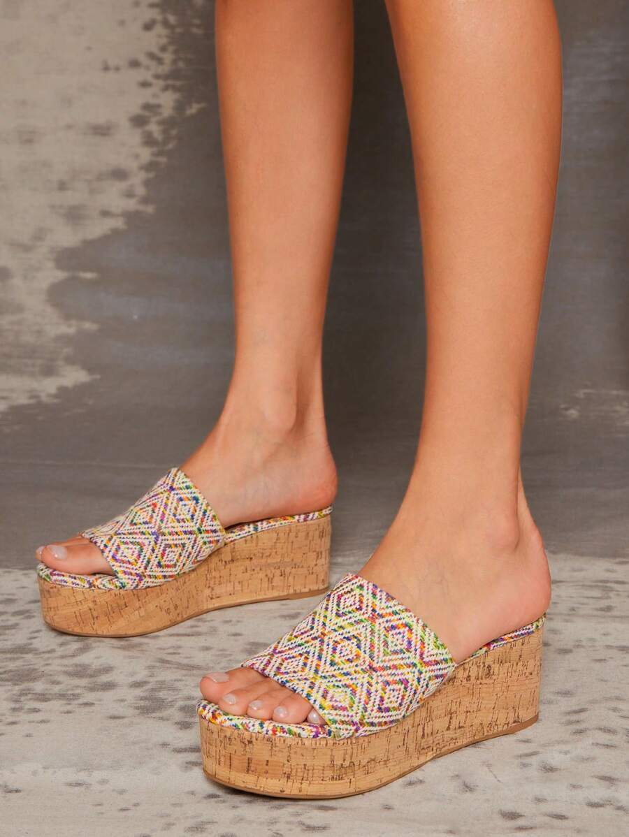 Treat mom to a touch of elegance with our Sleek One-Band Wedge Sandals. The perfect Mother's Day gift, these minimalist heels offer comfort and style in one. Give her a lift (literally) with these sleek sandals.