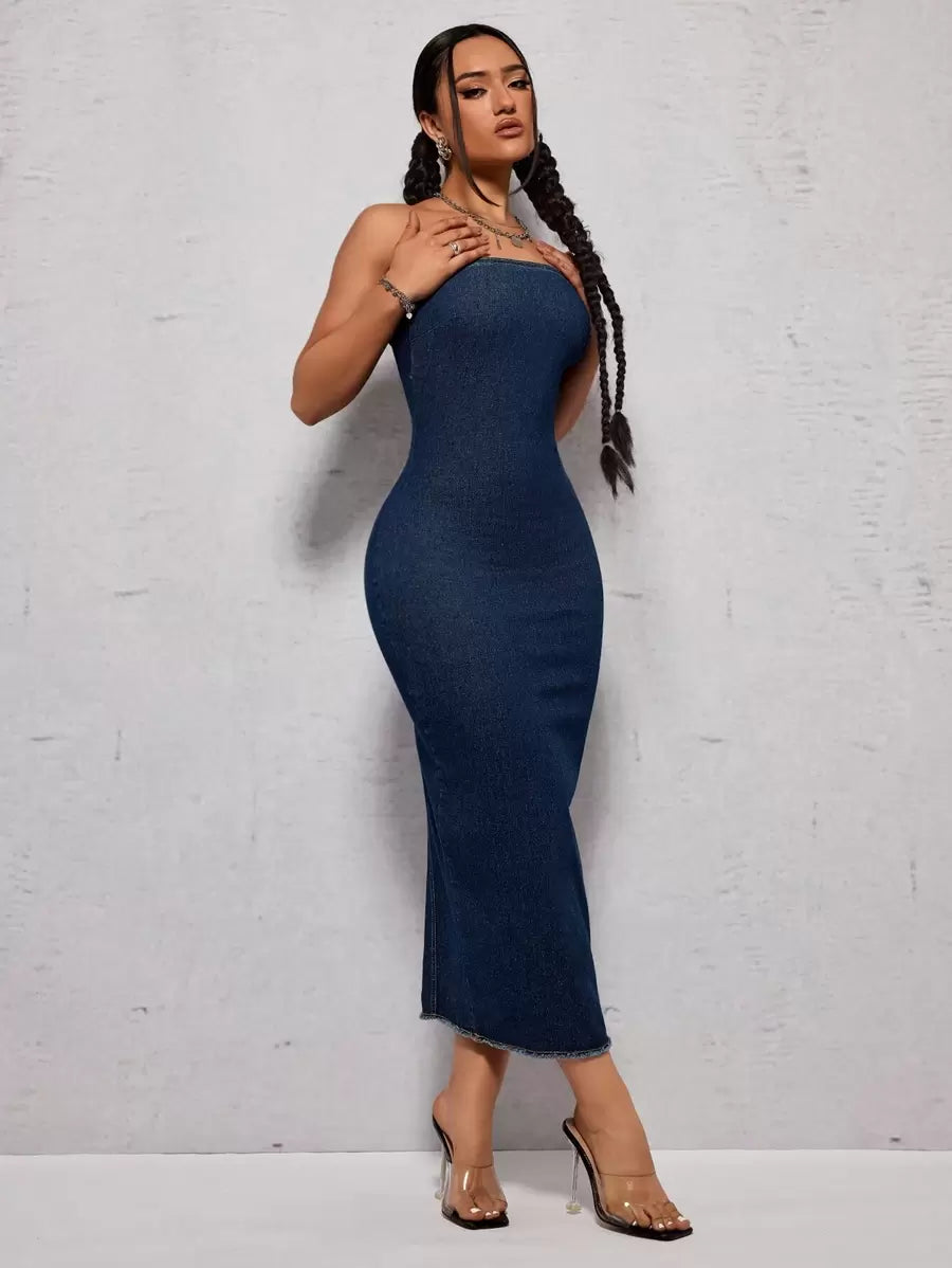 Elevate your casual wardrobe with this sleek strapless denim dress. The slim fit silhouette hugs your curves while the stylish back slit adds movement and modern flair. Perfect for warm-weather outings, date nights, or weekend adventures, this versatile piece transitions seamlessly from day to night. Pair with sneakers for laid-back vibes or dress up with heels for an effortlessly chic statement. Crafted from quality denim that holds its shape, this dress is a timeless addition to any closet.