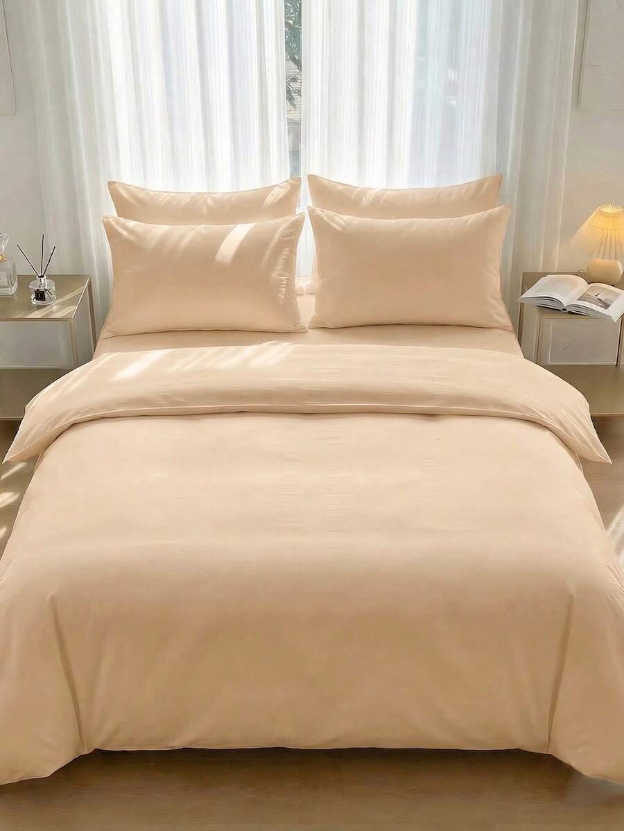 Wrap yourself in luxury with this solid color bedding set, designed for everyday comfort and special occasions alike. Featuring a pre-washed microfiber duvet cover paired with soft polyester pillowcases, this minimalist set delivers a clean, sophisticated look that complements any bedroom décor. The skin-friendly materials provide gentle comfort throughout all seasons, while the durable construction withstands regular washing. 