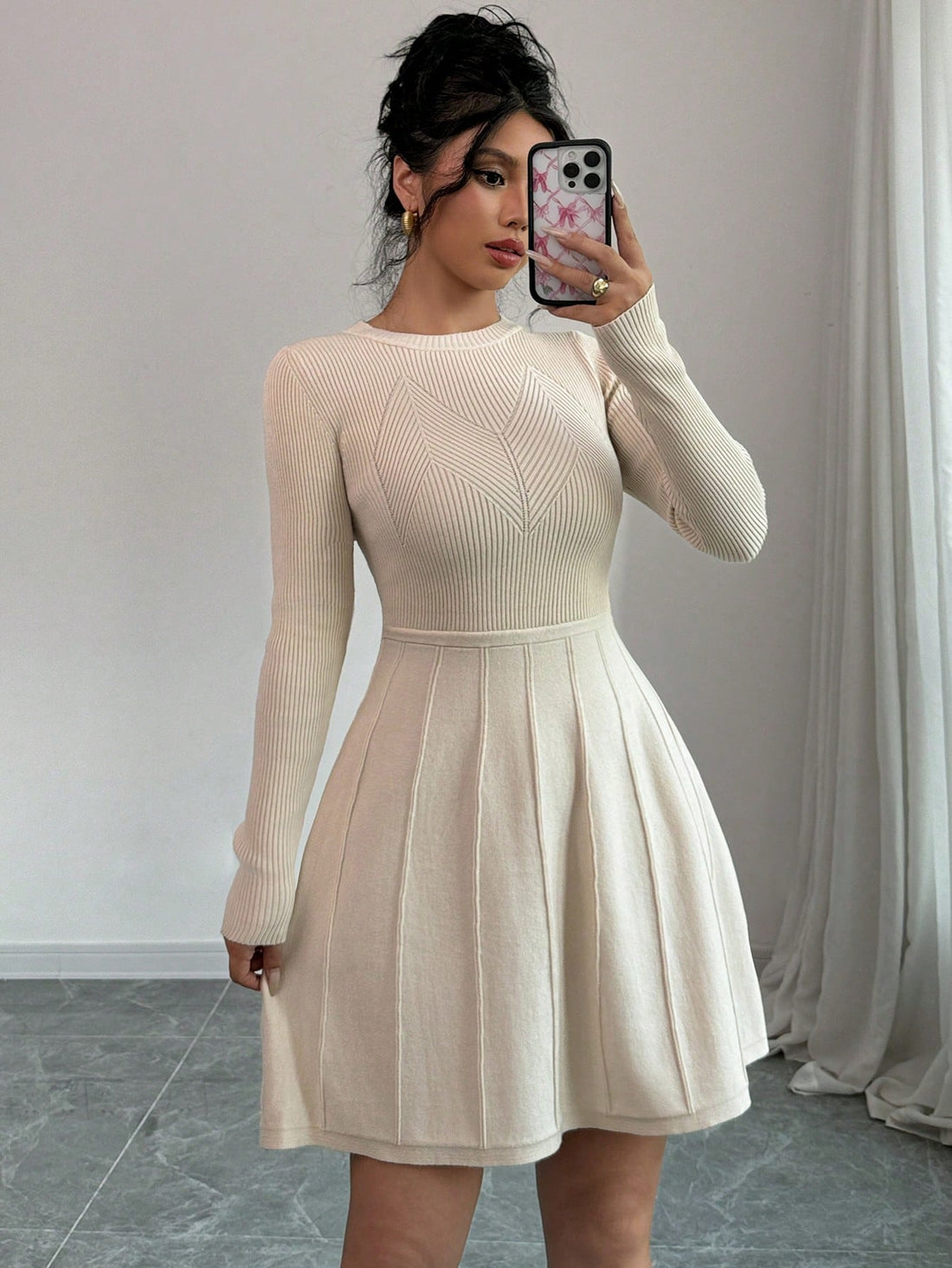 This solid color bodycon sweater dress is designed for effortless everyday elegance. Its flared hem adds a subtle touch of femininity, while the bodycon fit flatters your curves. Perfect for any occasion, this dress will make you feel confident and stylish.
