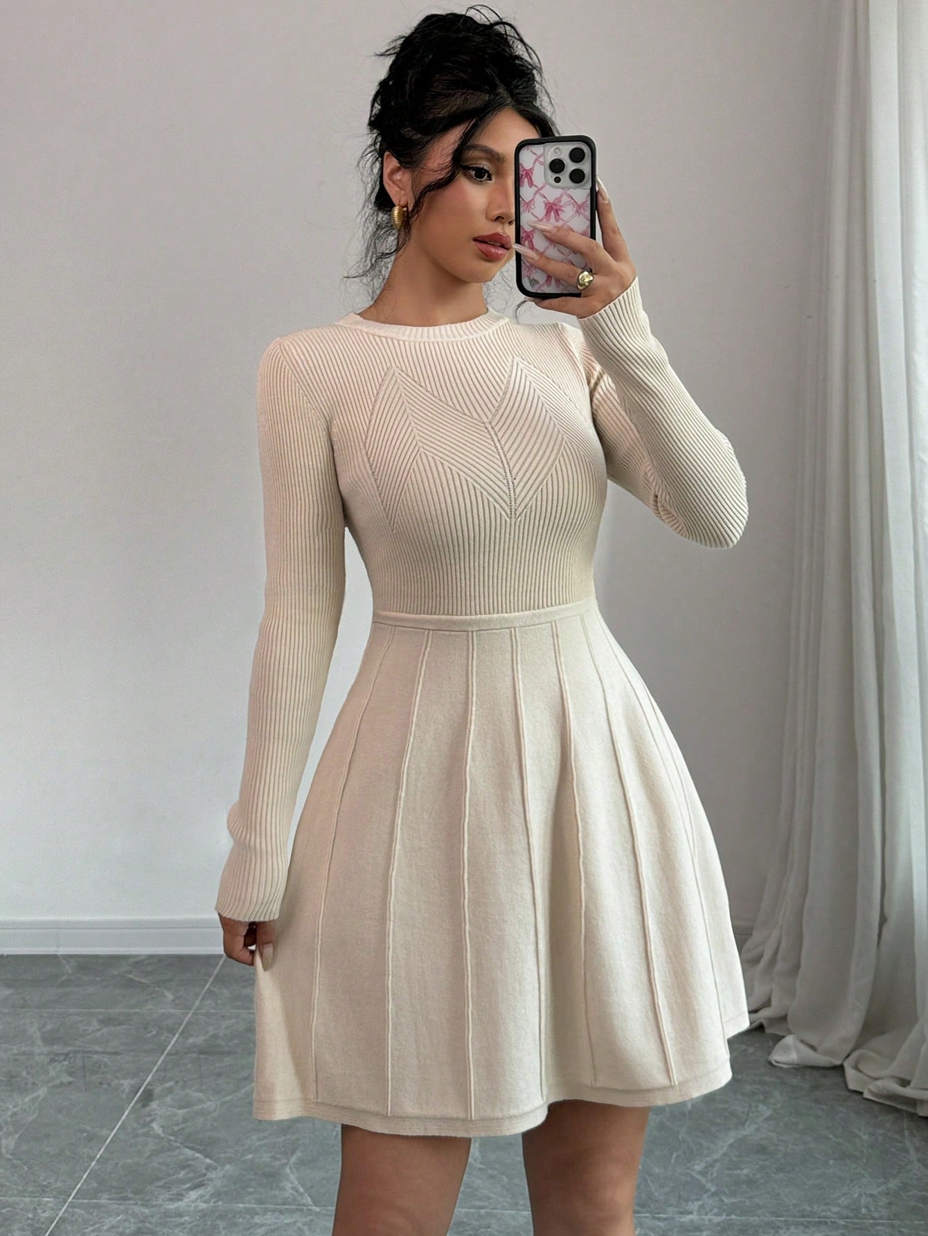 This solid color bodycon sweater dress is designed for effortless everyday elegance. Its flared hem adds a subtle touch of femininity, while the bodycon fit flatters your curves. Perfect for any occasion, this dress will make you feel confident and stylish.