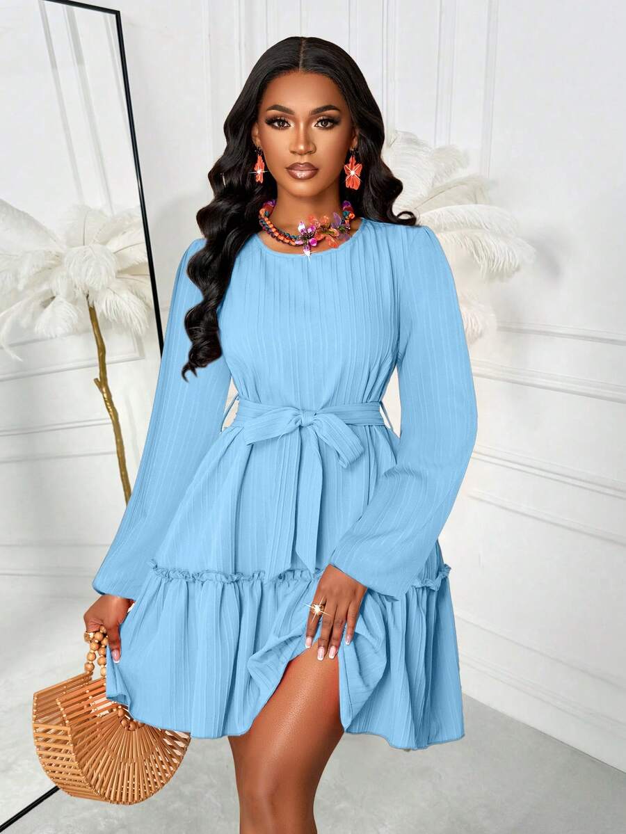 Effortless style meets comfort in this charming solid-color dress! Featuring long sleeves and a flattering waist tie knot detail, it's the perfect piece for casual outings, weekend hangouts, or whenever you want to look put-together without trying too hard. The short length keeps things breezy and fun, while the timeless solid hue pairs with practically everything in your closet. Dress it up with sneakers for a laid-back vibe or add heels for an instant upgrade. Your new go-to favorite awaits!