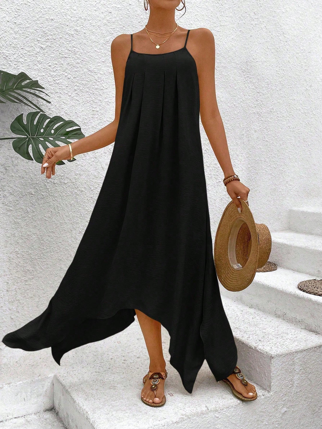 This flowy pleated maxi dress is your ticket to carefree beach days! With adjustable cami straps and a flattering silhouette, you'll dance from shoreline strolls to sunset dinners without missing a beat. The solid color design makes accessorizing a breeze – just add sandals, a floppy hat, and you're vacation-ready in seconds!