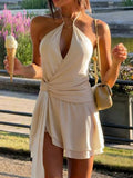 Effortless elegance meets vacation vibes with this solid color twist back halter mini dress. The flattering halter neckline and unique twisted back detail create a chic, modern silhouette perfect for beach days, resort getaways, and warm-weather adventures.