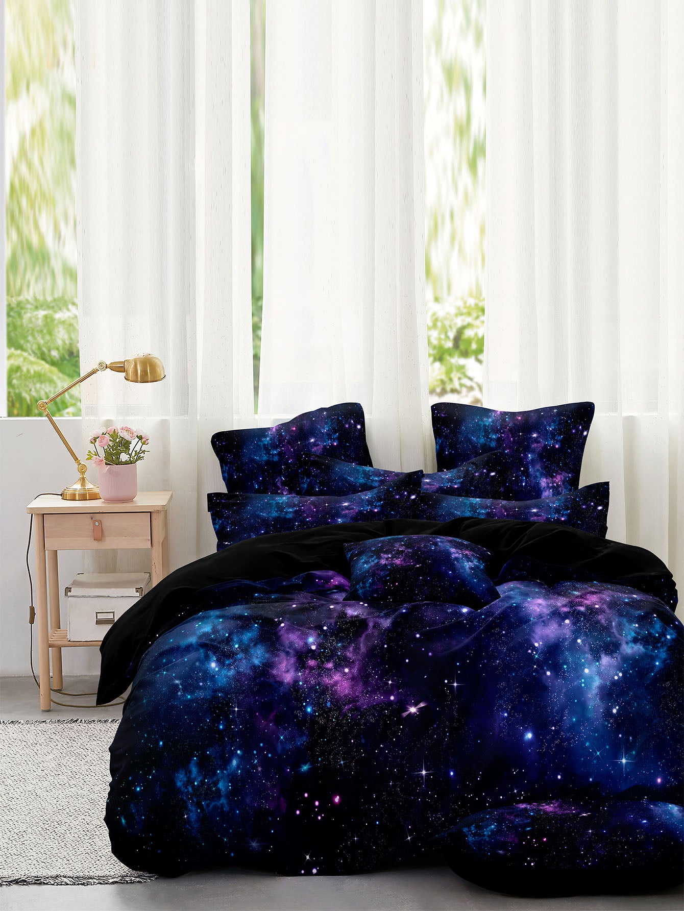 Transform your bedroom into a modern and dreamy space with our Space-Inspired Galaxy Duvet Cover Set. Featuring a stunning galaxy print, this set is perfect for adding a touch of celestial magic to any bedroom. Made with high-quality materials, it provides both style and comfort for a restful night's sleep.
