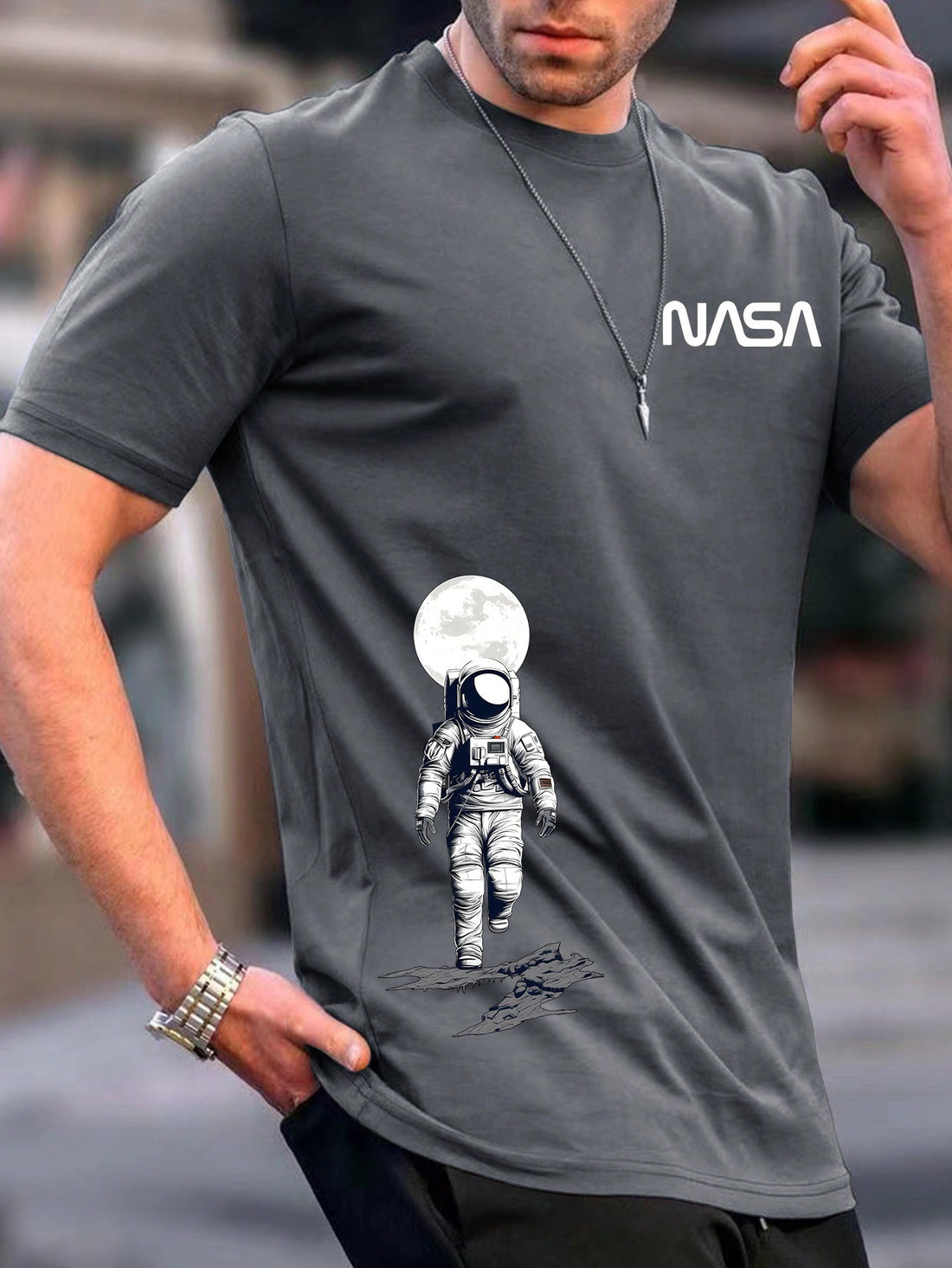 Fly in style with this slim fit t-shirt featuring a bold graphic of an astronaut exploring space. Perfect for any space lover, this t-shirt is sure to make you stand out. So suit up and take off with this quirky and unique design!
